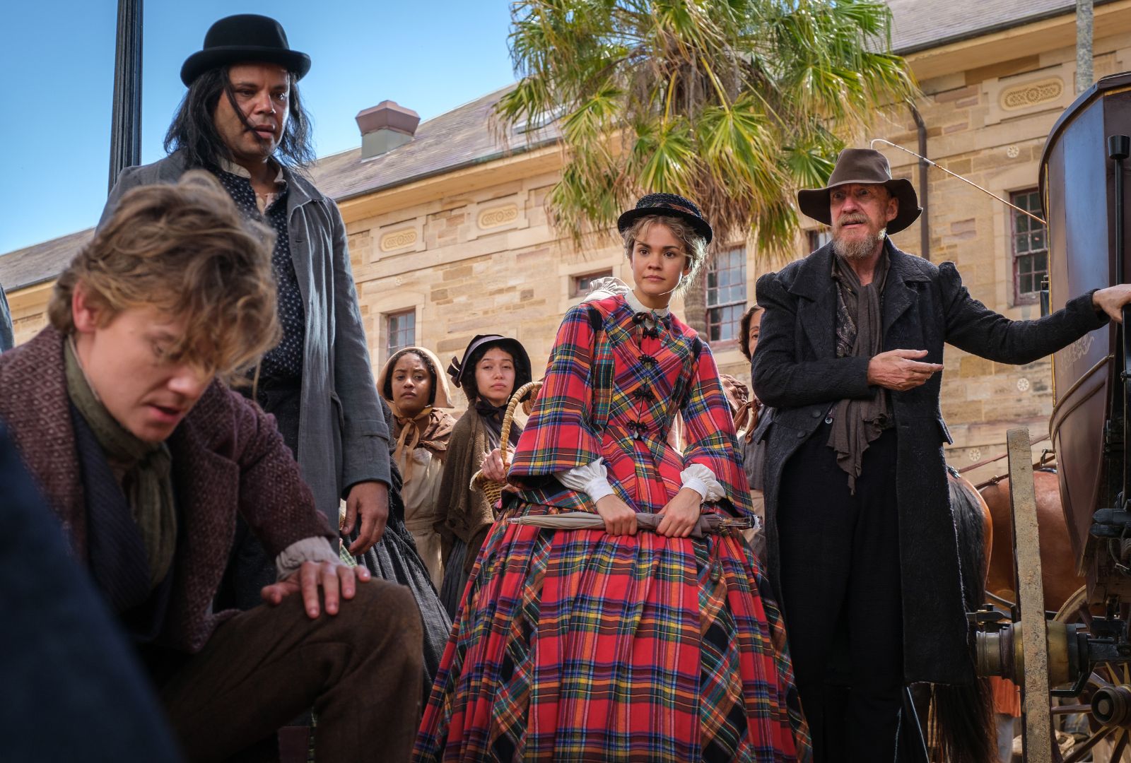 From left to right: Thomas Brodie-Sangster, Maia Mitchell and David Thewlis in Disney's The Artful Dodger.