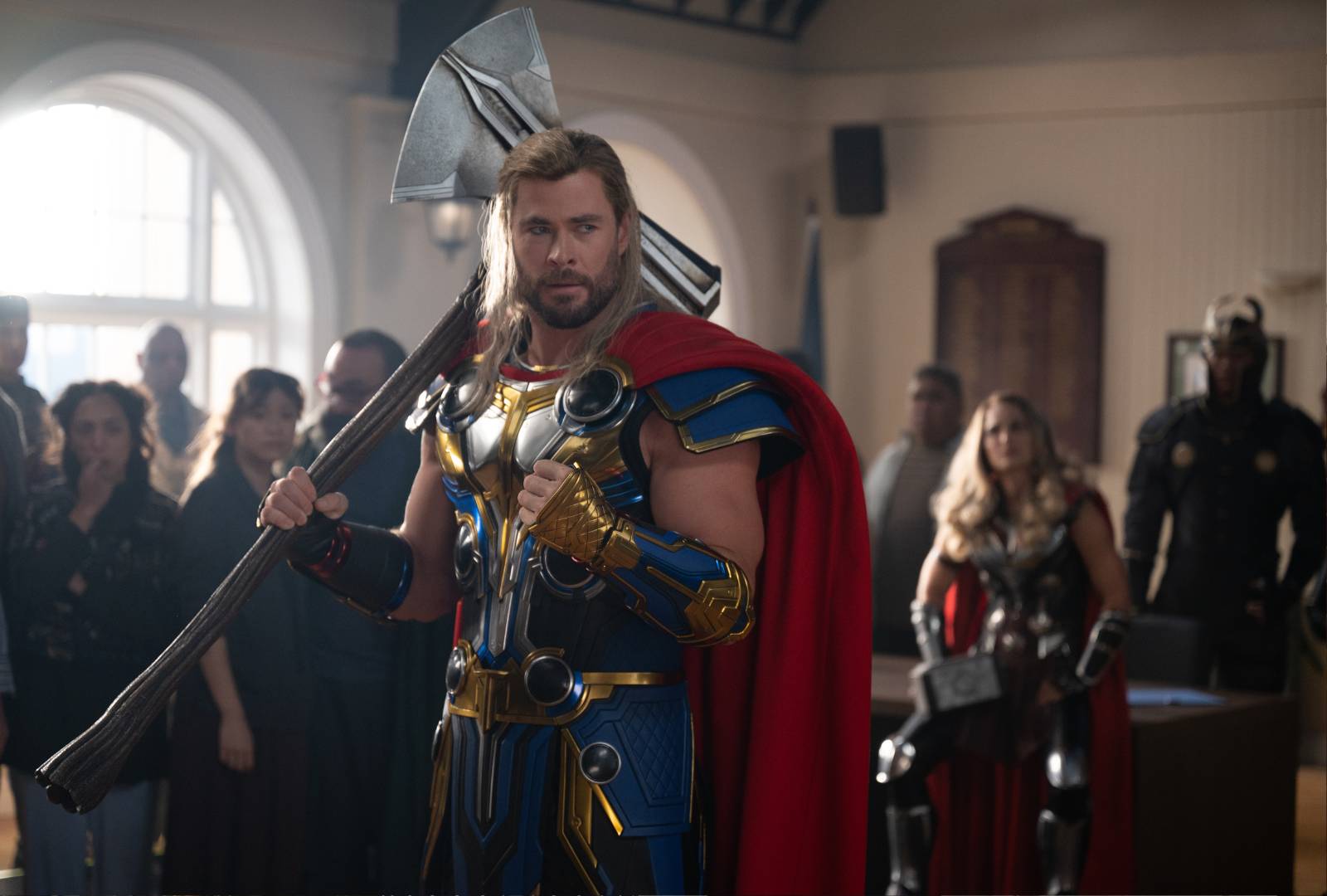 Chris Hemsworth as Thor and Natalie Portman as The Mighty Thor in Marvel Studios' THOR LOVE AND THUNDER. Photo by Jasin Boland. ©Marvel Studios 2022. All Rights Reserved.