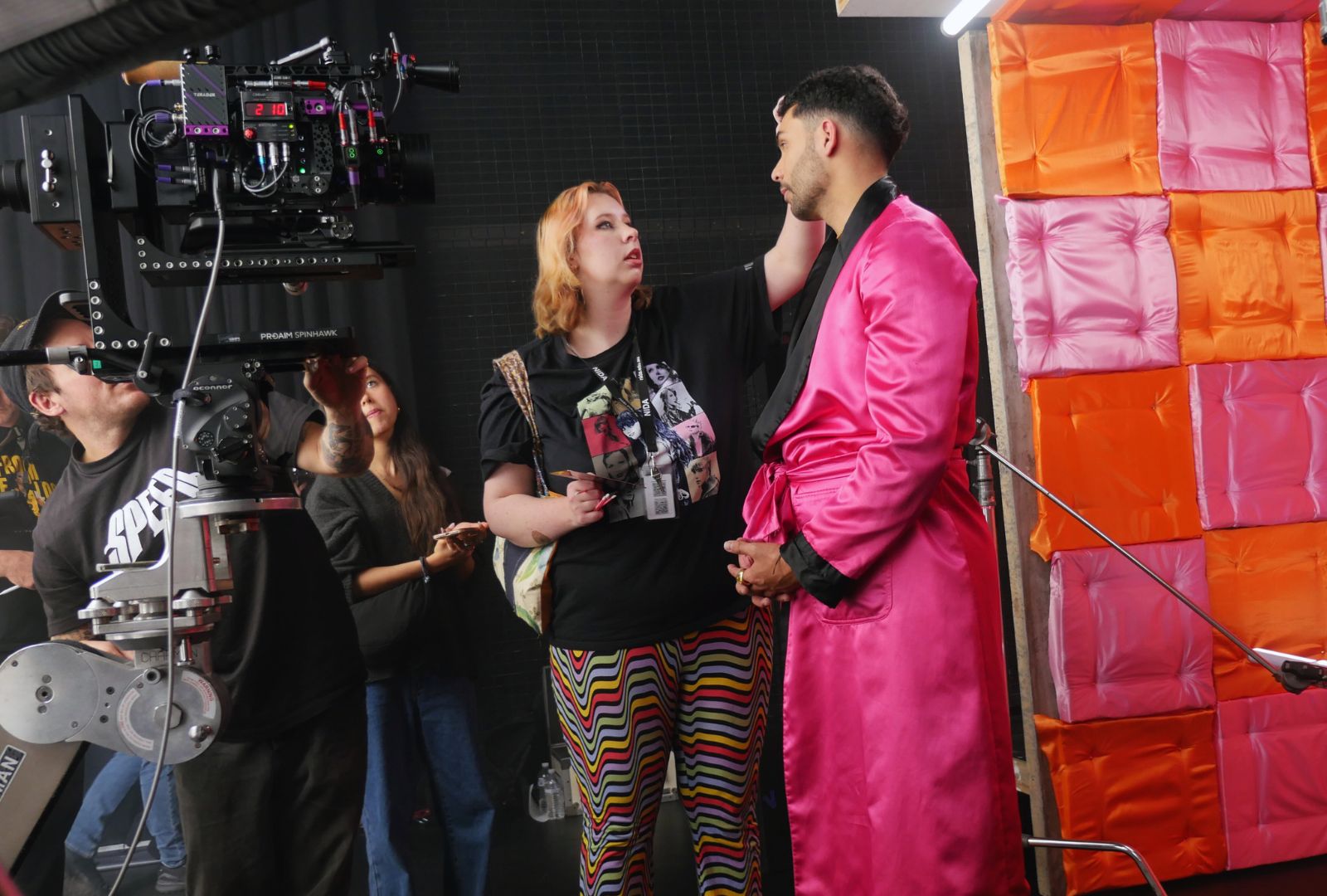 Make-up student Abbey Conroy touching up Denzel Kennedy on the set of ijustwannadance.